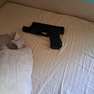 Sleeping-with-a-gun-under-your-pillow-v0-xyicn7jkl32b1.png